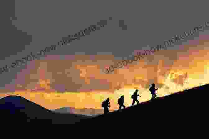 A Group Of Hikers Admire A Breathtaking Mountain Vista, The Sun Setting Behind Them. The Adventures Of The Mountain Men: True Tales Of Hunting Trapping Fighting Adventure And Survival