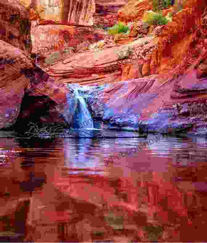 A Photograph Of A Canyon With Red Rock Cliffs And A Winding River The Canyon Chronicles Jim Landwehr