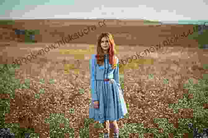 A Woman Standing In A Field Of Wildflowers, Representing The Seasons Of Life Seasons Of My Life Hannah Hauxwell