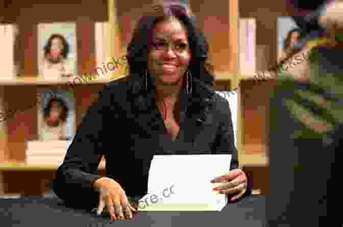 Michelle Obama Holds A Copy Of Her Memoir, Becoming. Chasing Light: Michelle Obama Through The Lens Of A White House Photographer