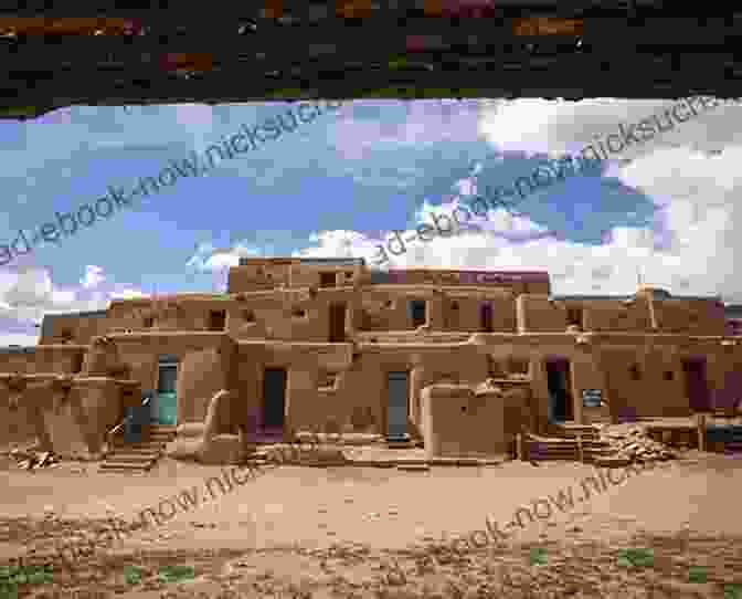 The Ancient Taos Pueblo, A UNESCO World Heritage Site, Beckons Travelers Along The Winding Road A Winding Road To The Land Of Enchantment